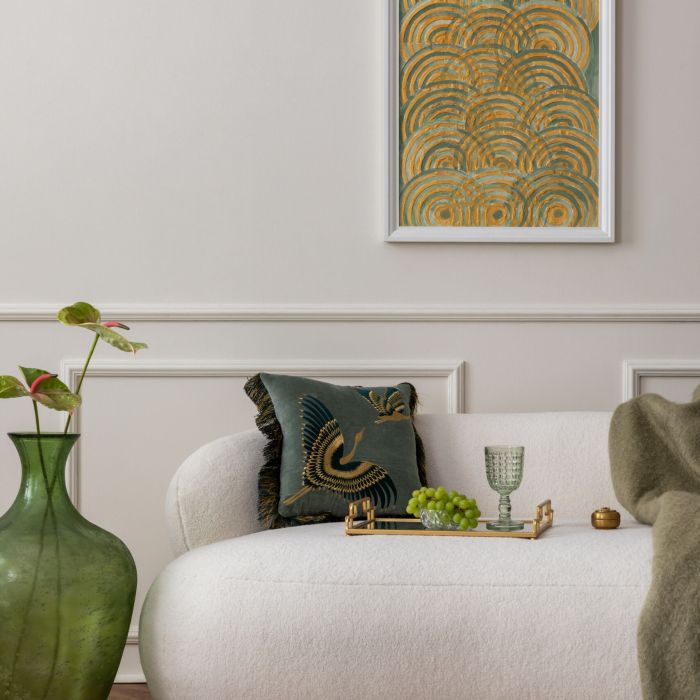 Living room interior with mock up poster frame, beige sofa, green pillow, plaid, glass vase with flowers, wall with stucco, round rug and personal accessories. Home decor. Template.